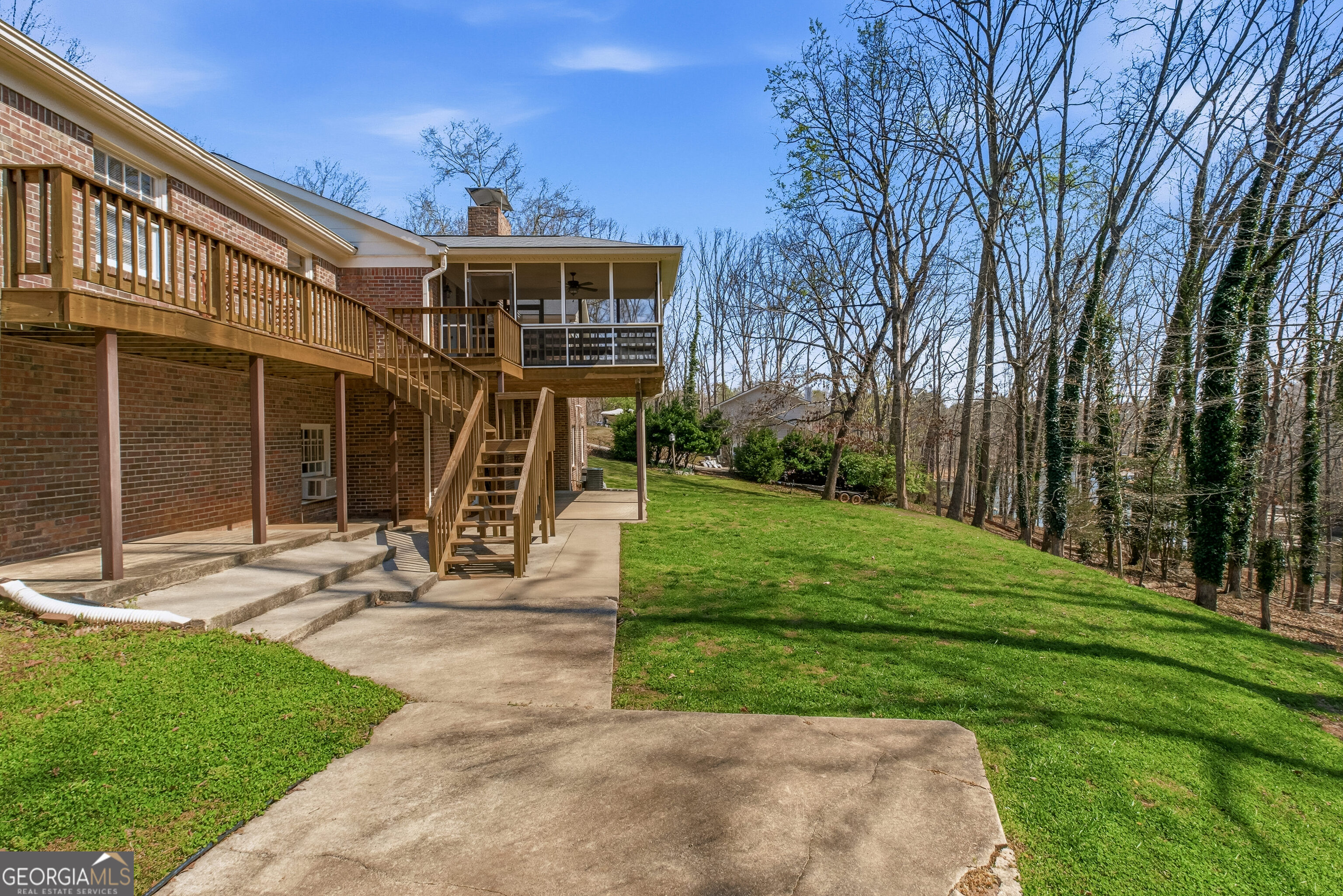 3302 Hickory Point Gainesville, GA 30506 - Photo 64 of 73 a view of a house with backyard and sitting area