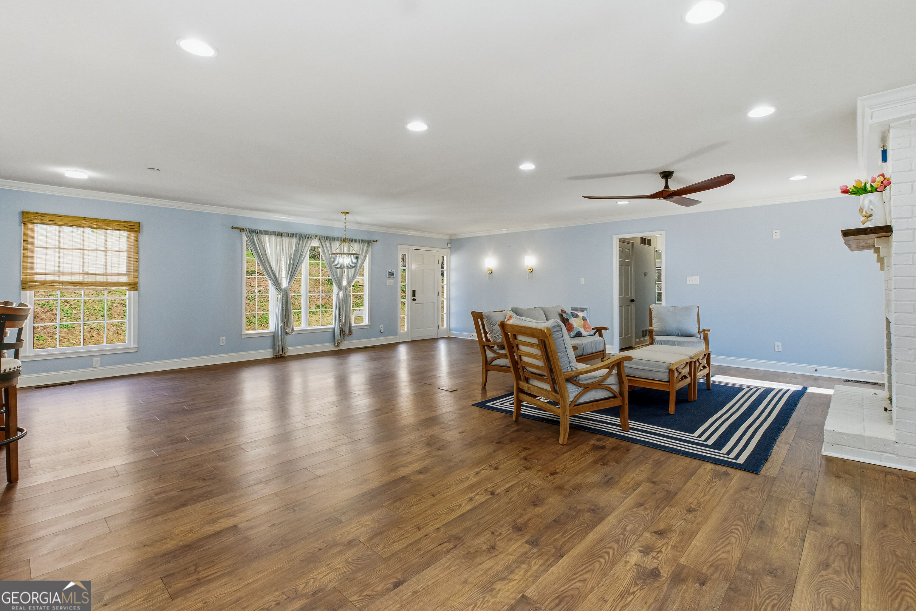 3302 Hickory Point Gainesville, GA 30506 - Photo 10 of 73 a living room with furniture and a wooden floor