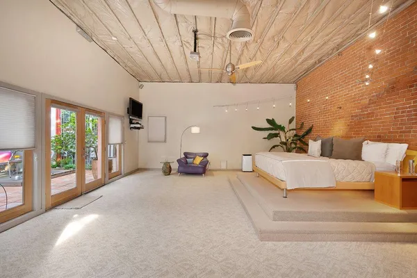 a view of a chairs and tables in patio