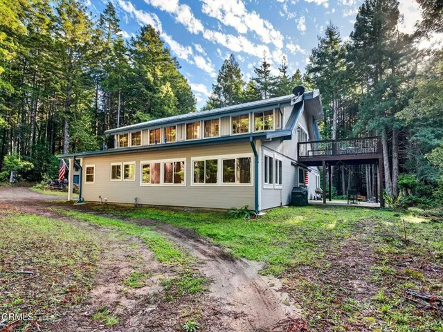 a house that has a lot of plants in it