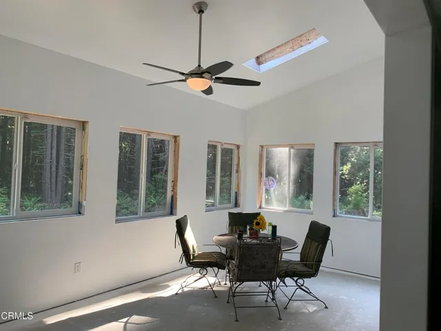 a backyard of a house with lots of green space