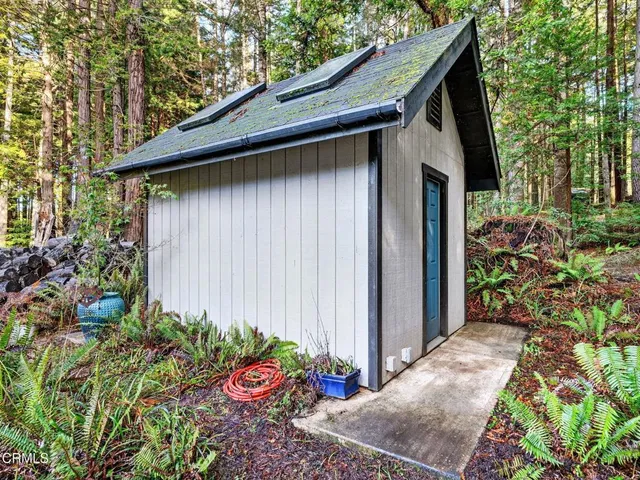 a view of a room with a door and a yard