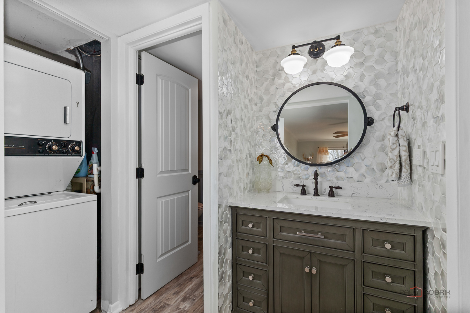 5844 Heather Ridge Drive, Unit 105 Gurnee, IL 60031 - Photo 11 of 25 a en suite bathroom with a sink double vanity and a mirror