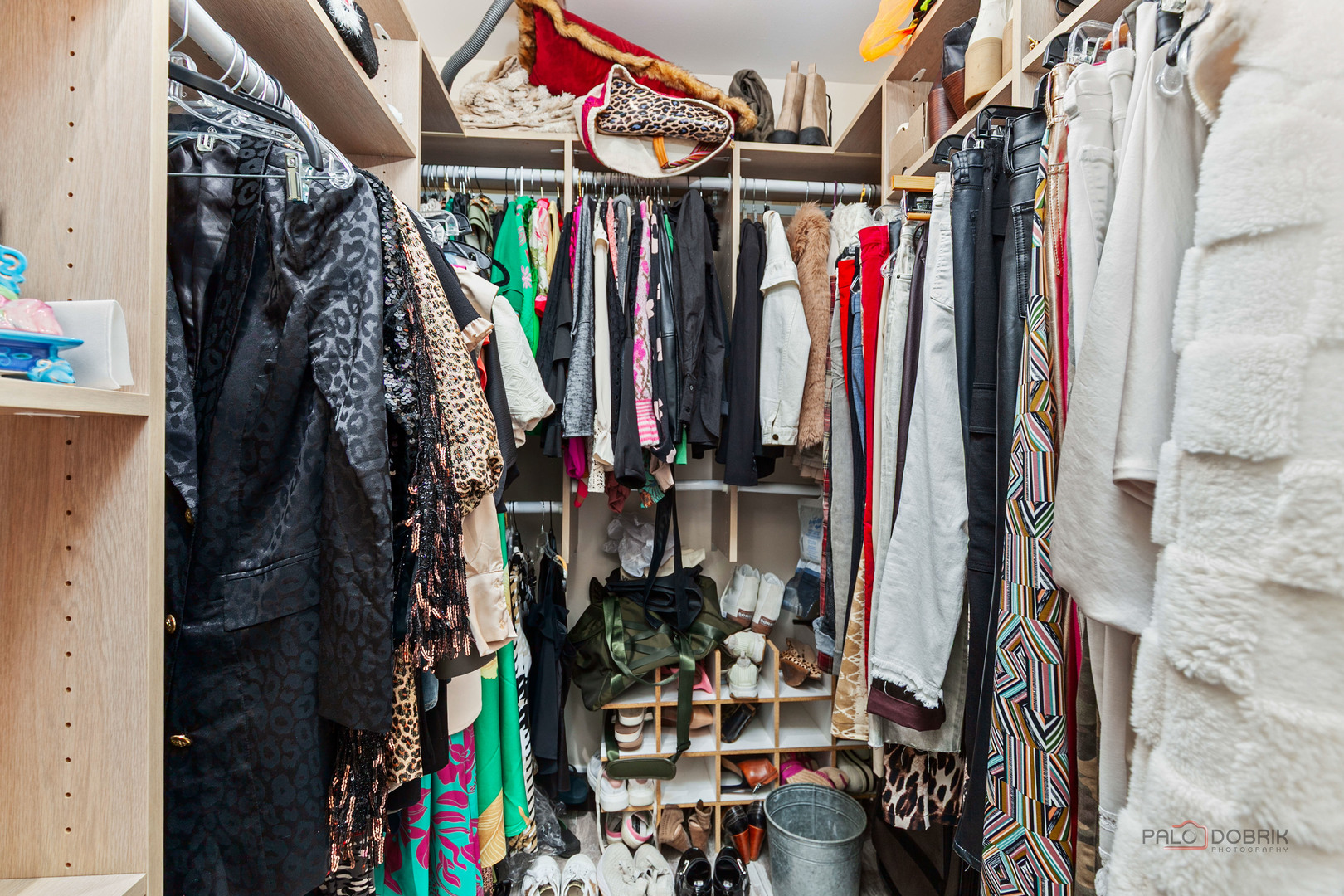 5844 Heather Ridge Drive, Unit 105 Gurnee, IL 60031 - Photo 13 of 25 a view of walk in closet with clothes and shoes
