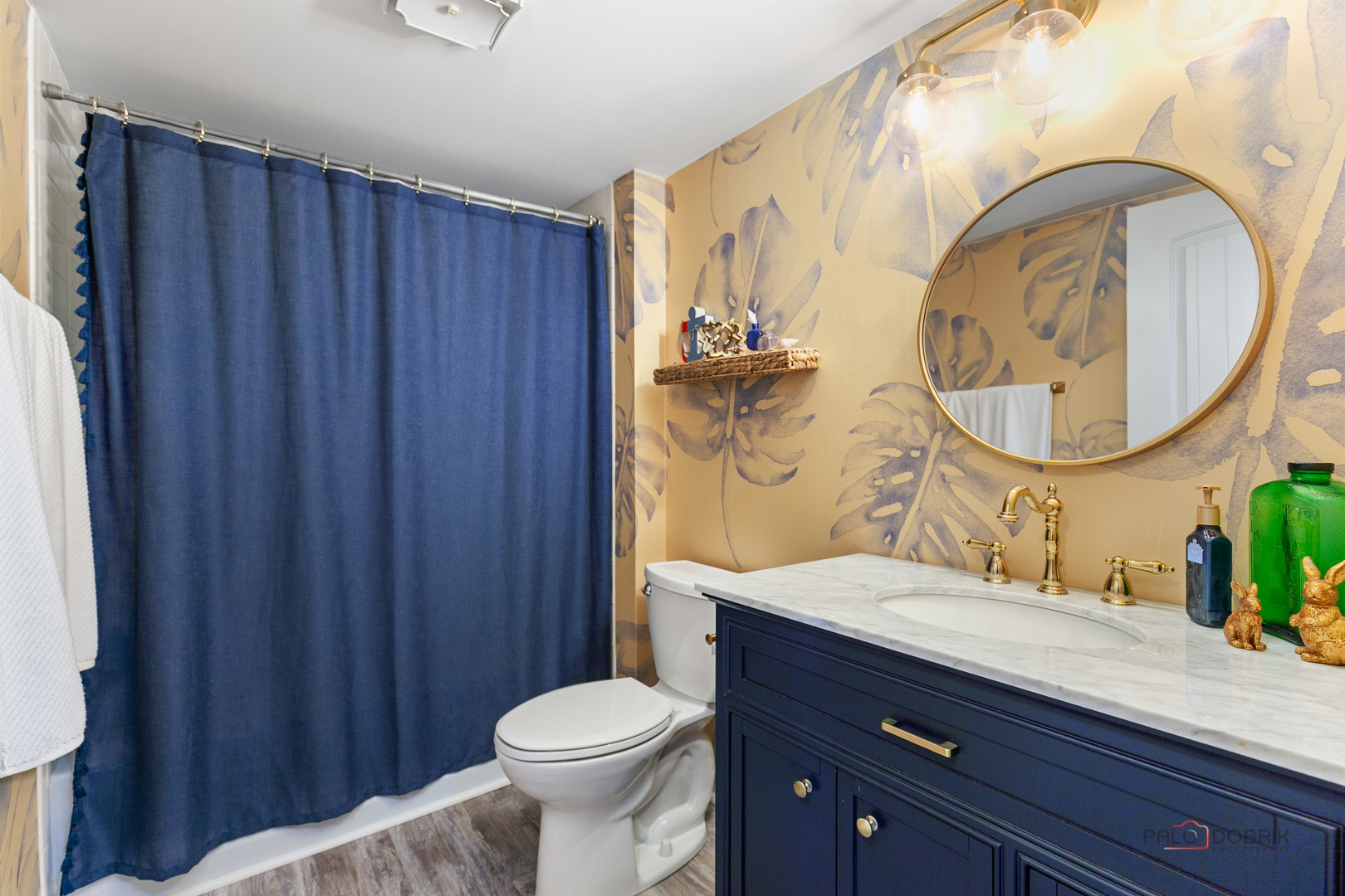 5844 Heather Ridge Drive, Unit 105 Gurnee, IL 60031 - Photo 15 of 25 a bathroom with a granite countertop toilet a sink and a mirror