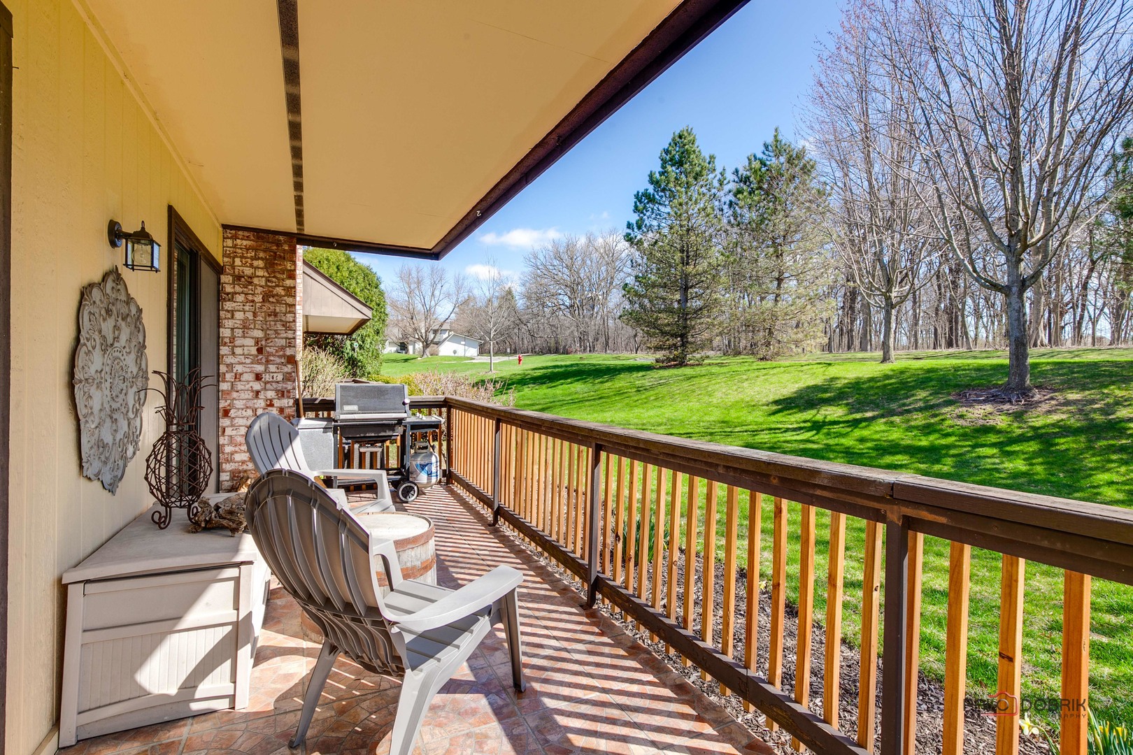5844 Heather Ridge Drive, Unit 105 Gurnee, IL 60031 - Photo 16 of 25 a balcony with chairs