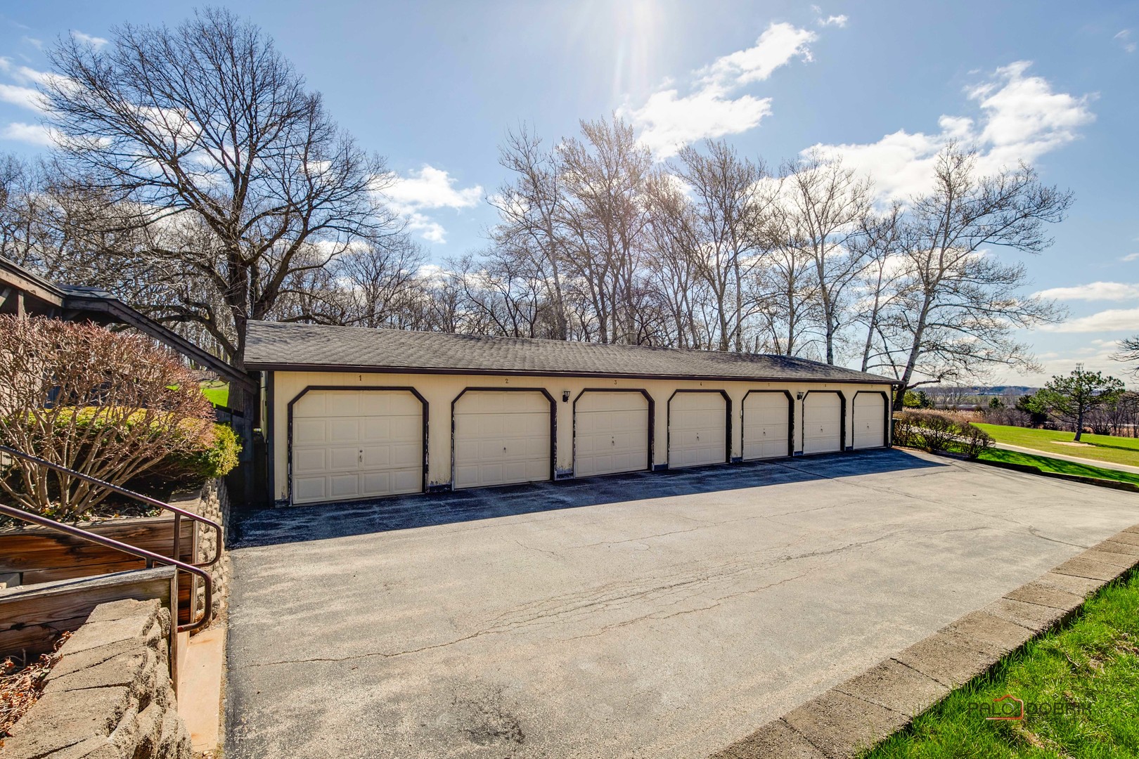 5844 Heather Ridge Drive, Unit 105 Gurnee, IL 60031 - Photo 18 of 25 a view of parking area with large trees