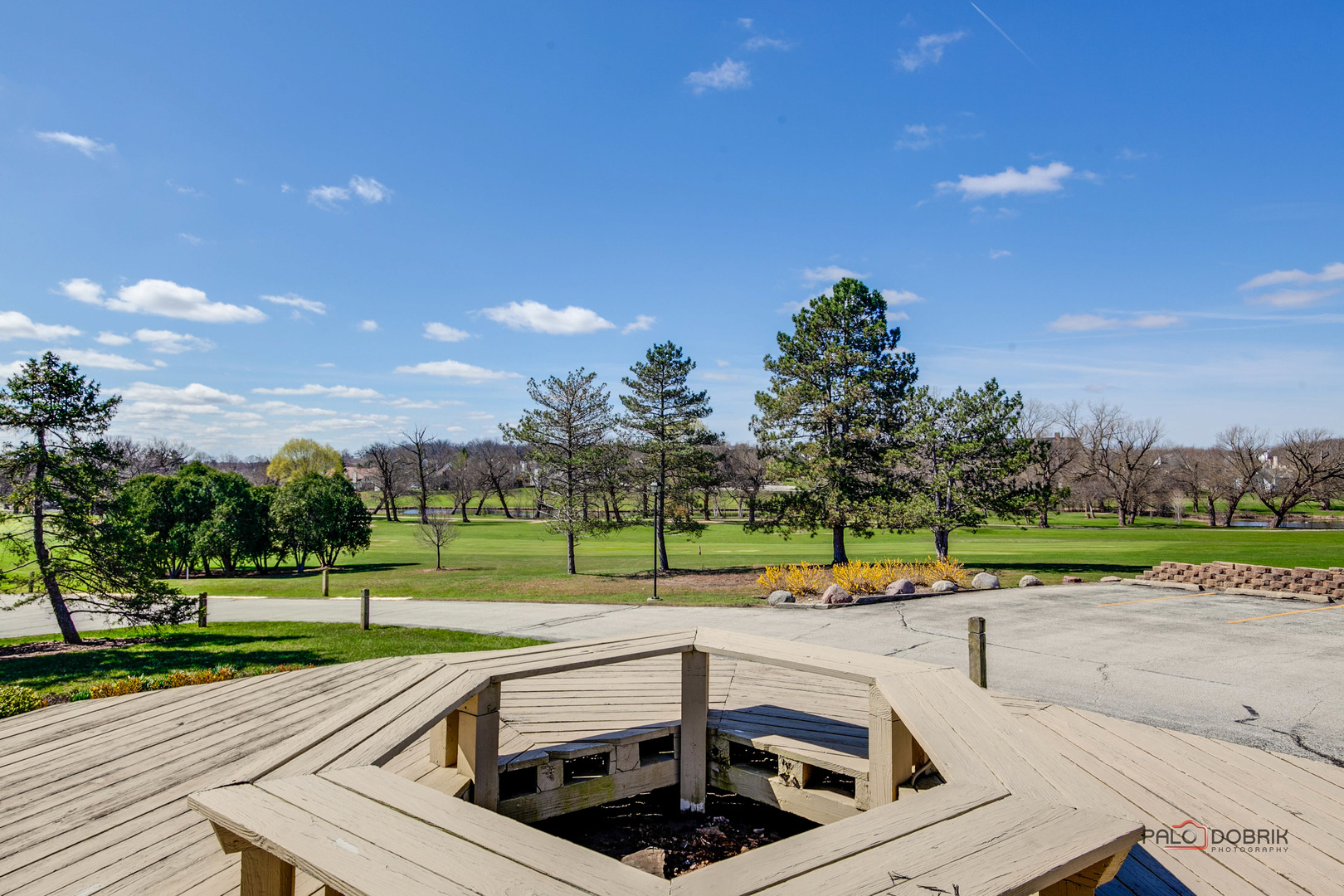 5844 Heather Ridge Drive, Unit 105 Gurnee, IL 60031 - Photo 24 of 25 a view of a park with swings and slides