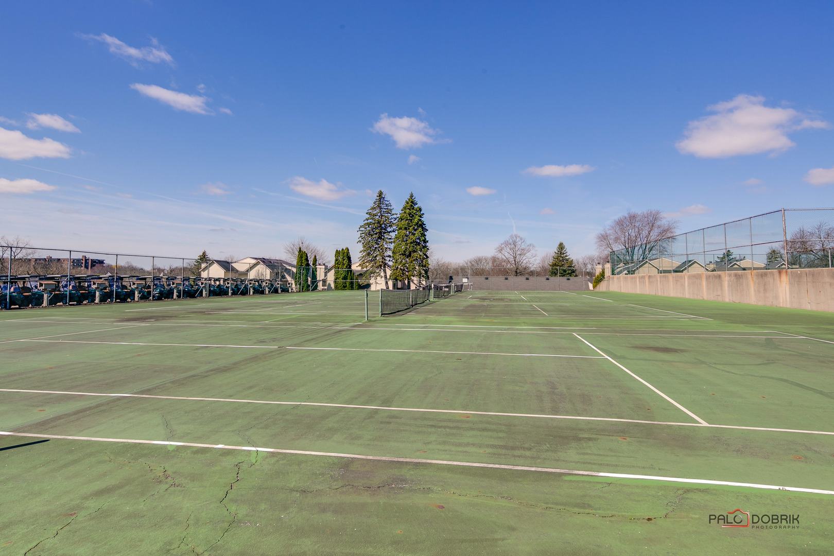 5844 Heather Ridge Drive, Unit 105 Gurnee, IL 60031 - Photo 25 of 25 a view of an outdoor space and tennis court