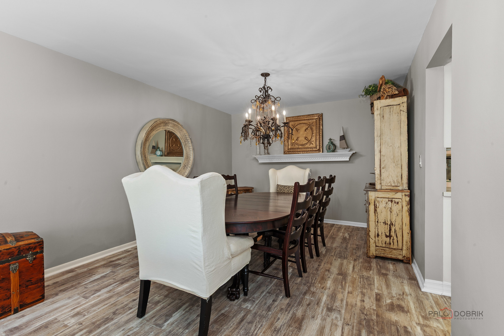 5844 Heather Ridge Drive, Unit 105 Gurnee, IL 60031 - Photo 5 of 25 a view of a dining room with furniture and wooden floor