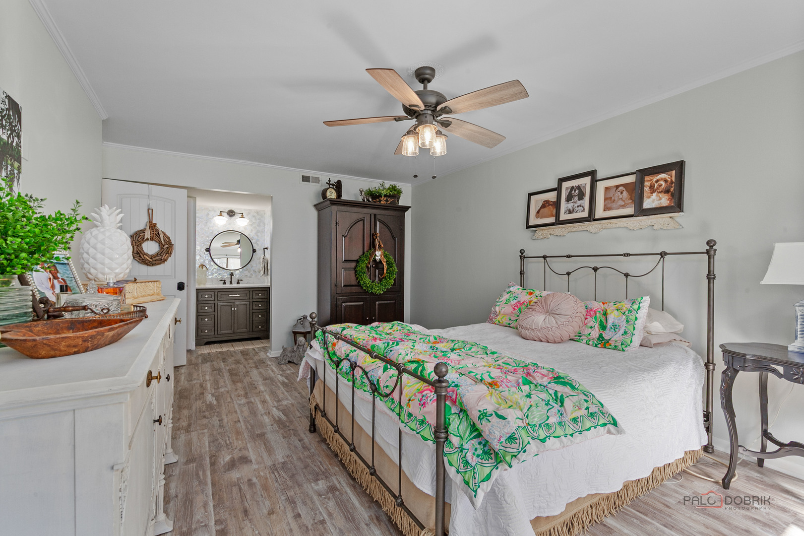 5844 Heather Ridge Drive, Unit 105 Gurnee, IL 60031 - Photo 10 of 25 a bedroom that has a bed and a table in it