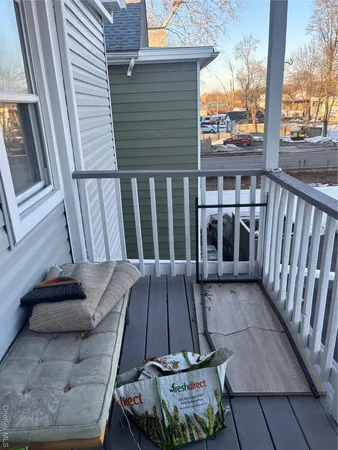 a view of backyard with outdoor seating