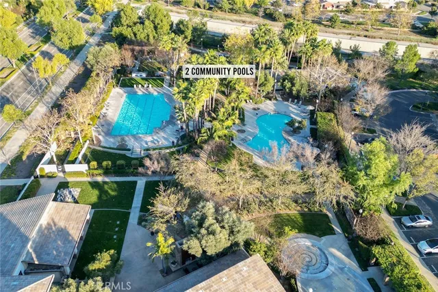 a childrens park with lots of swings and slides