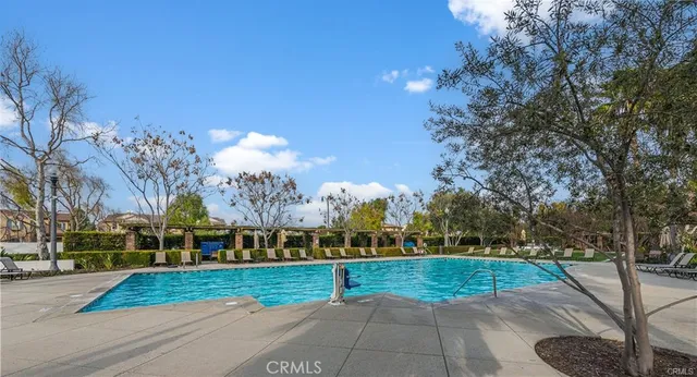 a childrens park with lots of swings slides and slide