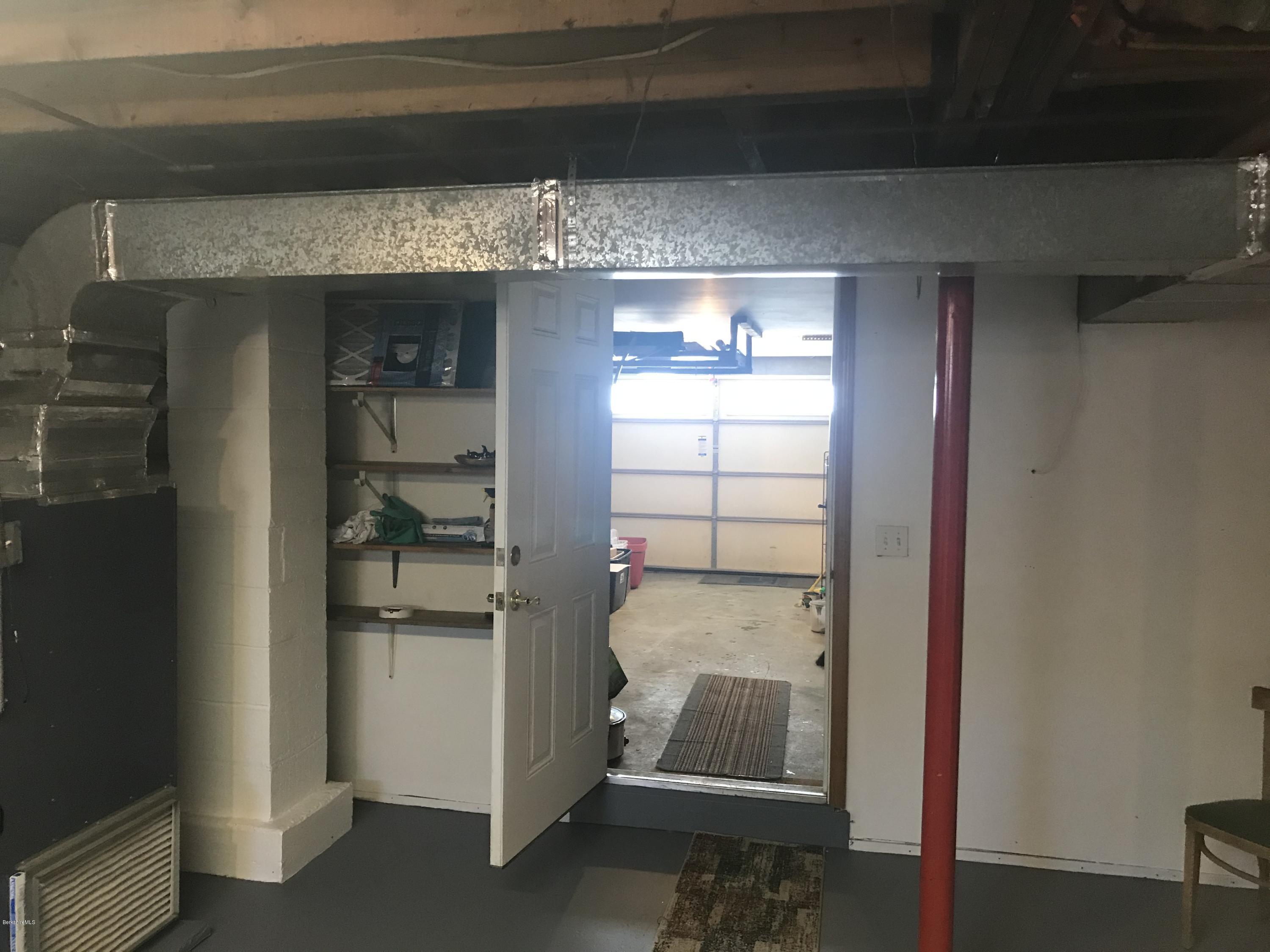 98 Loop Road Savoy, MA 01256 - Photo 12 of 20 a room with storage and utility