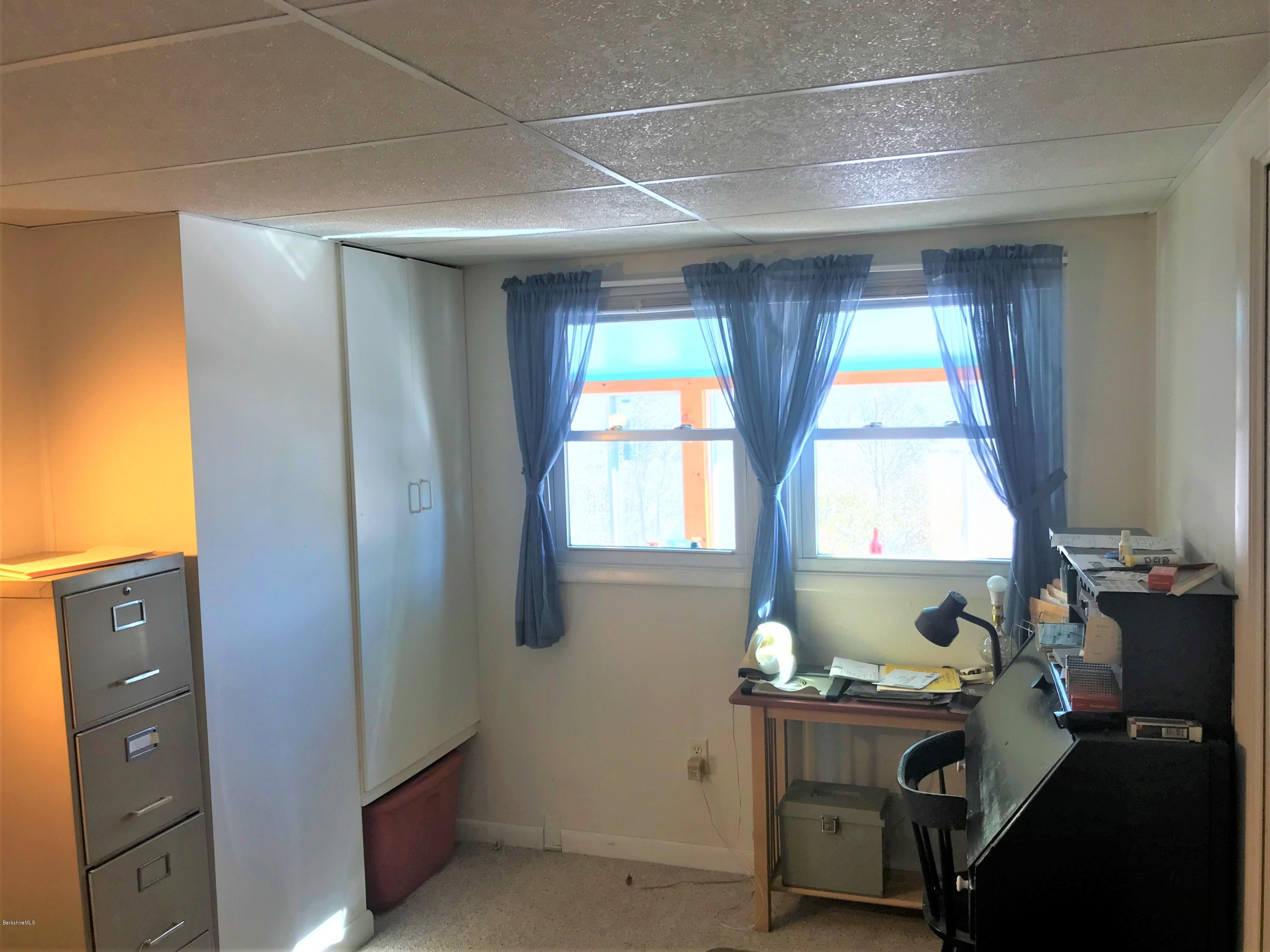 98 Loop Road Savoy, MA 01256 - Photo 8 of 20 a workspace with a window