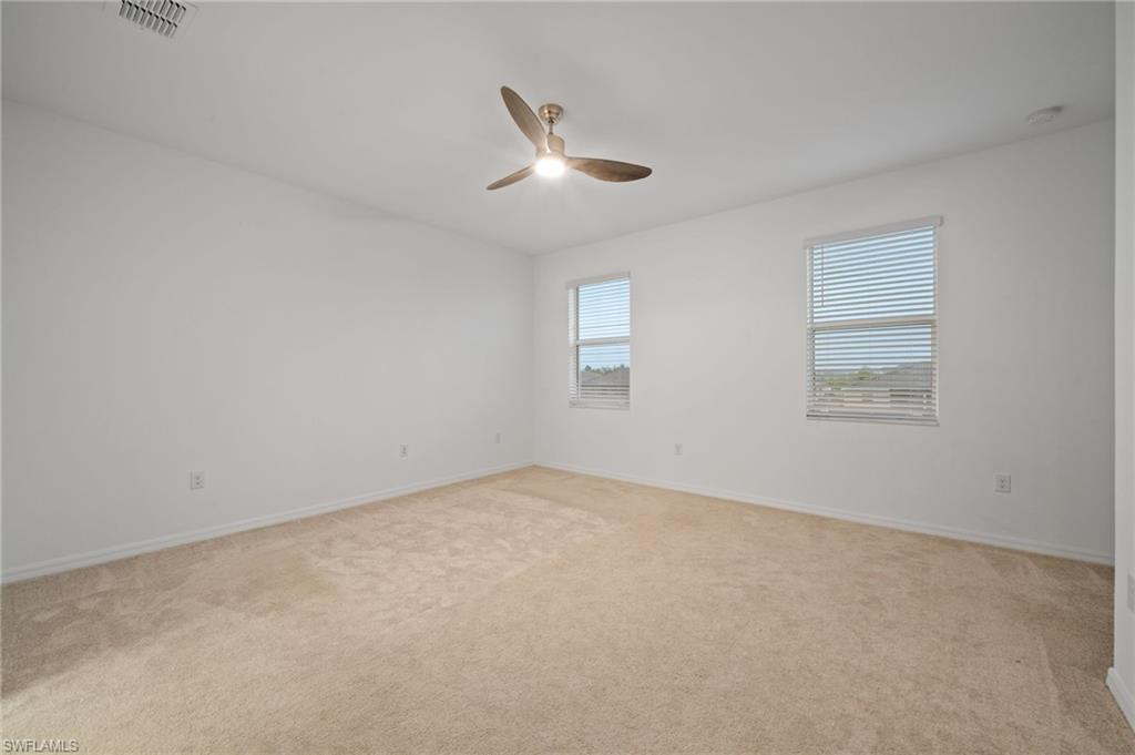 2878 Blossom Way Naples, FL 34120 - Photo 19 of 41 an empty room with a window