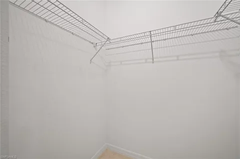 a view of a room with racks on the wall