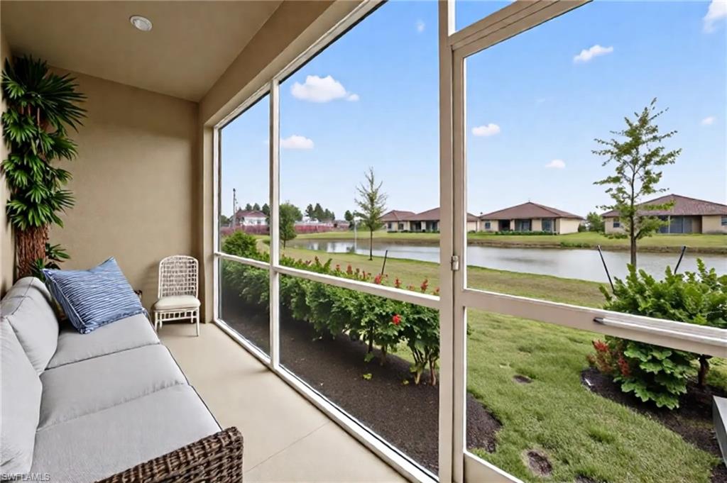 2878 Blossom Way Naples, FL 34120 - Photo 6 of 41 a view of a balcony and lake view