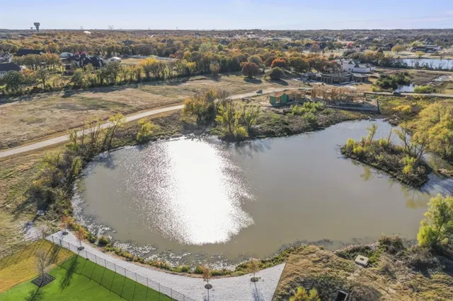 a view of a lake in middle of the town