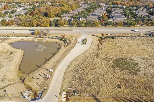 a view of a swimming pool and an outdoor space