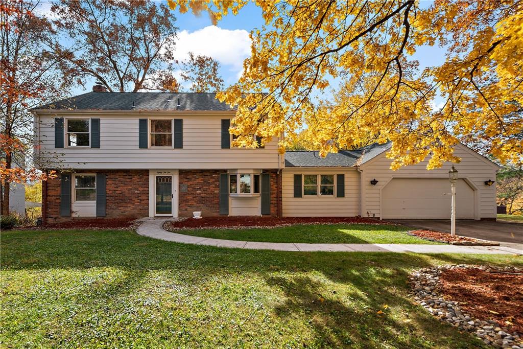 8210 Bramble Lane Pittsburgh, PA 15237 - Photo 1 of 25 a front view of a house with a yard