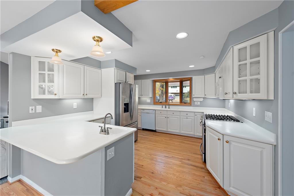 8210 Bramble Lane Pittsburgh, PA 15237 - Photo 8 of 25 a kitchen with a sink stove and cabinets