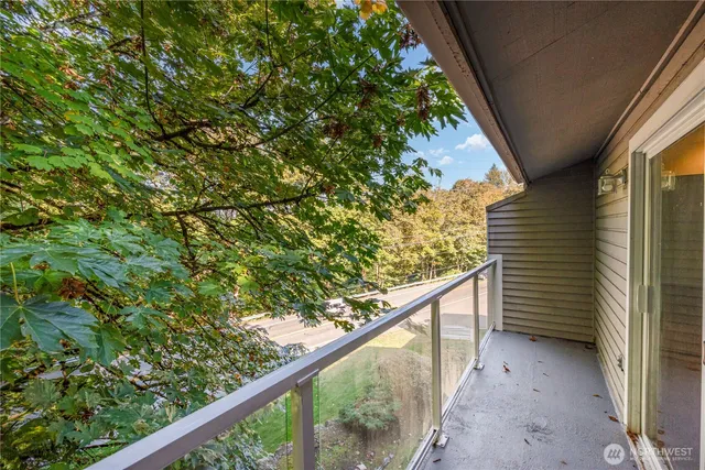 a view of a balcony with an outdoor space