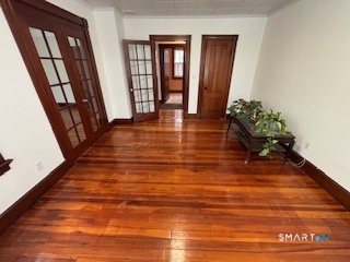 445 Church Street, Unit 2 Wallingford, CT 06492 - Photo 7 of 15 a view of an entryway with wooden floor