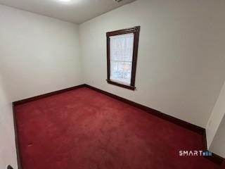 445 Church Street, Unit 2 Wallingford, CT 06492 - Photo 10 of 15 an empty room with windows