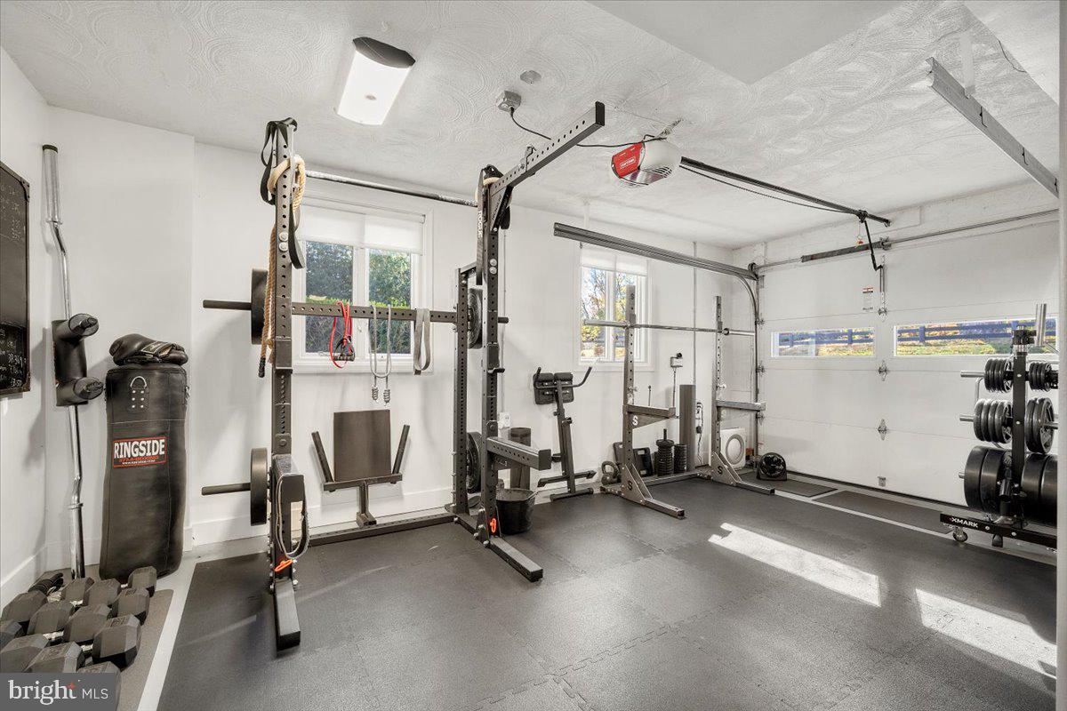 10801 Spring Knoll Drive Potomac, MD 20854 - Photo 72 of 100 a view of a room with gym equipment