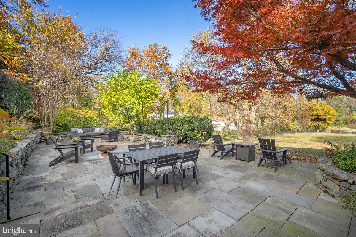 10801 Spring Knoll Drive Potomac, MD 20854 - Photo 80 of 100 a view of a tables and chairs in a patio