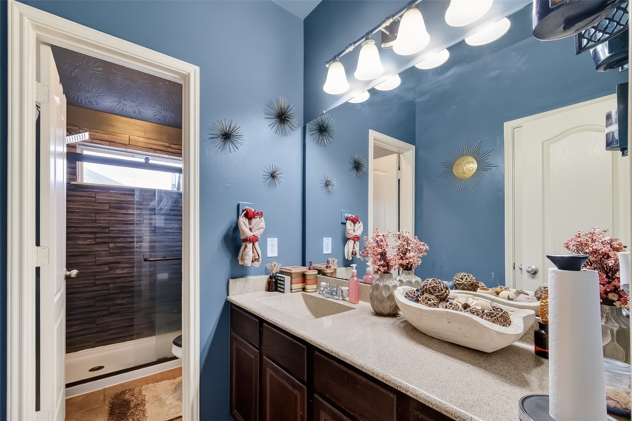 13415 Star Creek Lane Rosharon, TX 77583 - Photo 25 of 46 a bathroom with a sink and a mirror