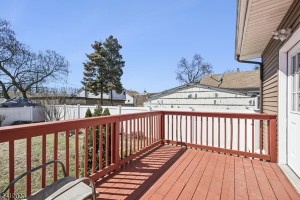 a view of balcony with wooden floor