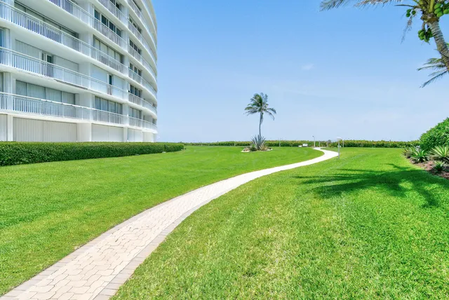 a view of a balcony next to an ocean