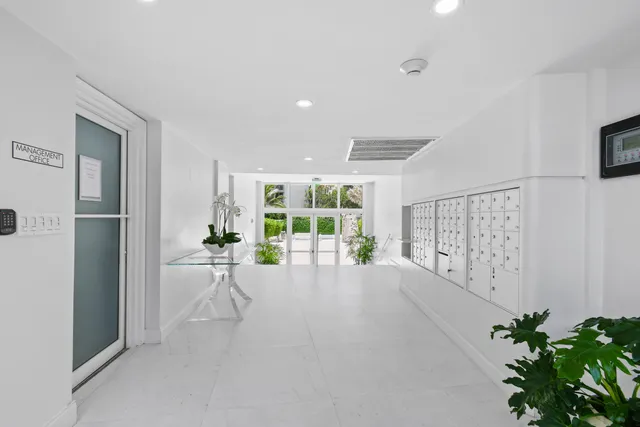 a view of a livingroom with furniture and a window