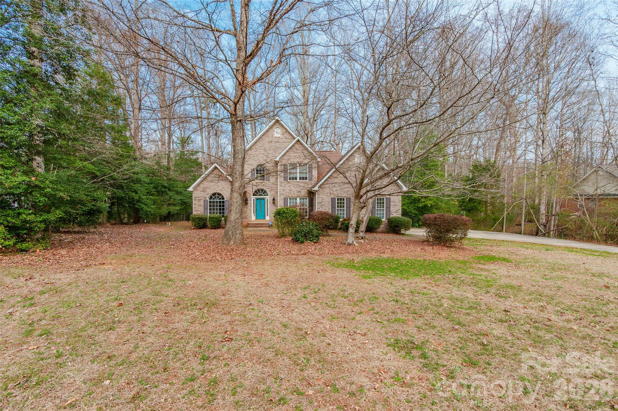 321 Forbes Court Clover, SC 29710 - Photo 2 of 31 a view of road with large trees
