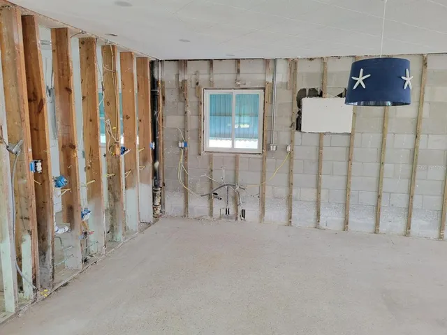 a bathroom with a sink vanity and a mirror