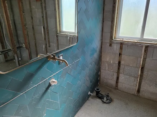 a view of a room with a large window