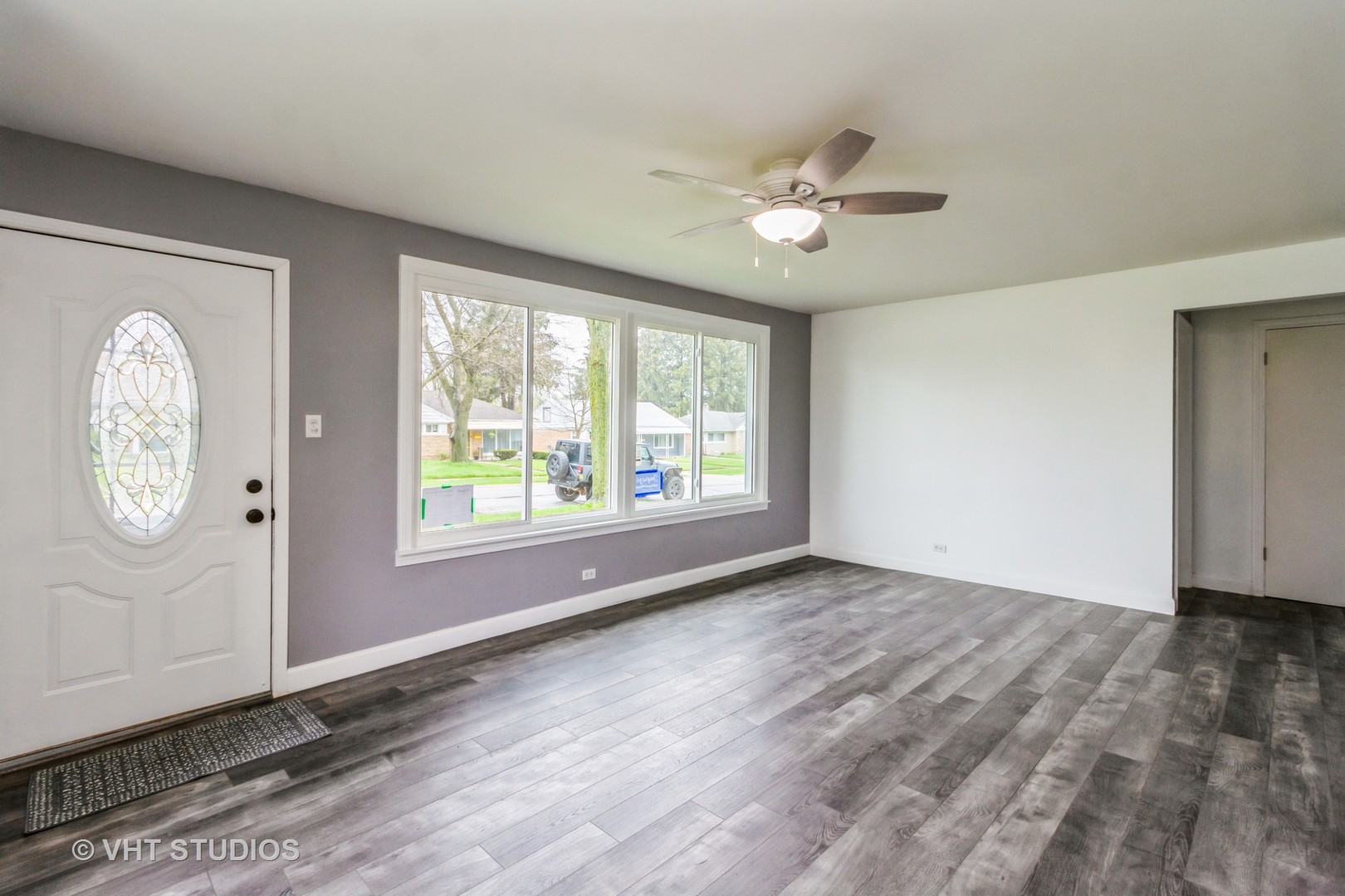 17560 Sycamore Drive Homewood, IL 60430 - Photo 3 of 13 wooden floor in an empty room with a window