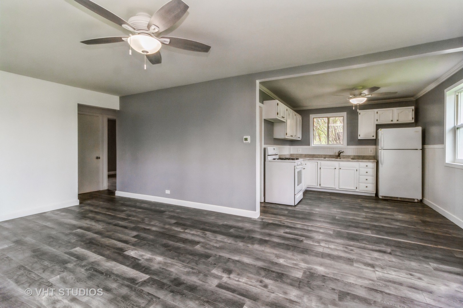 17560 Sycamore Drive Homewood, IL 60430 - Photo 6 of 13 a view of a kitchen with a sink cabinets and wooden floor
