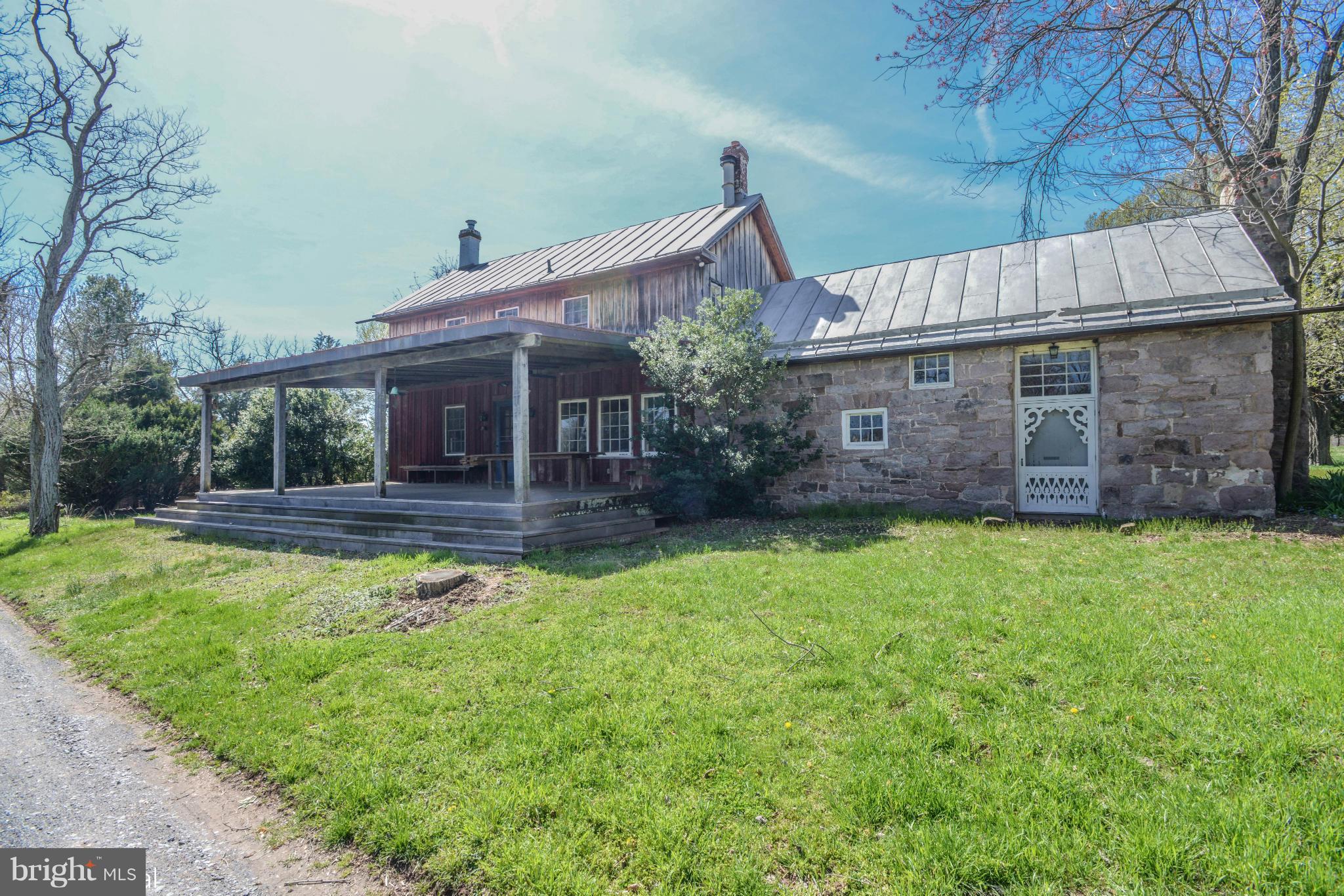 17300 White Ground Road Boyds, MD 20841 - Photo 2 of 18 a front view of a house with a garden