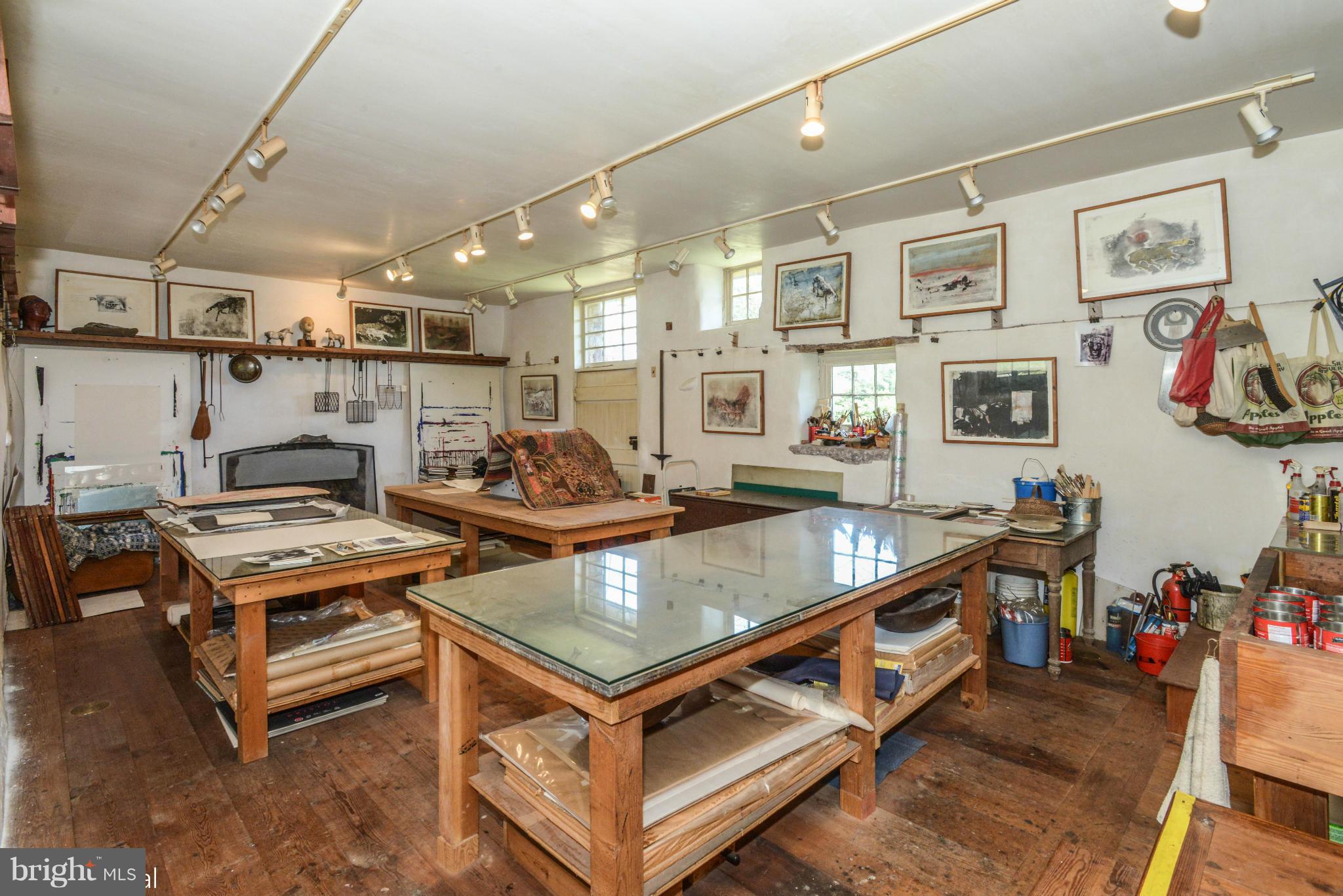 17300 White Ground Road Boyds, MD 20841 - Photo 13 of 18 a living room with lots of furniture and paintings on the wall
