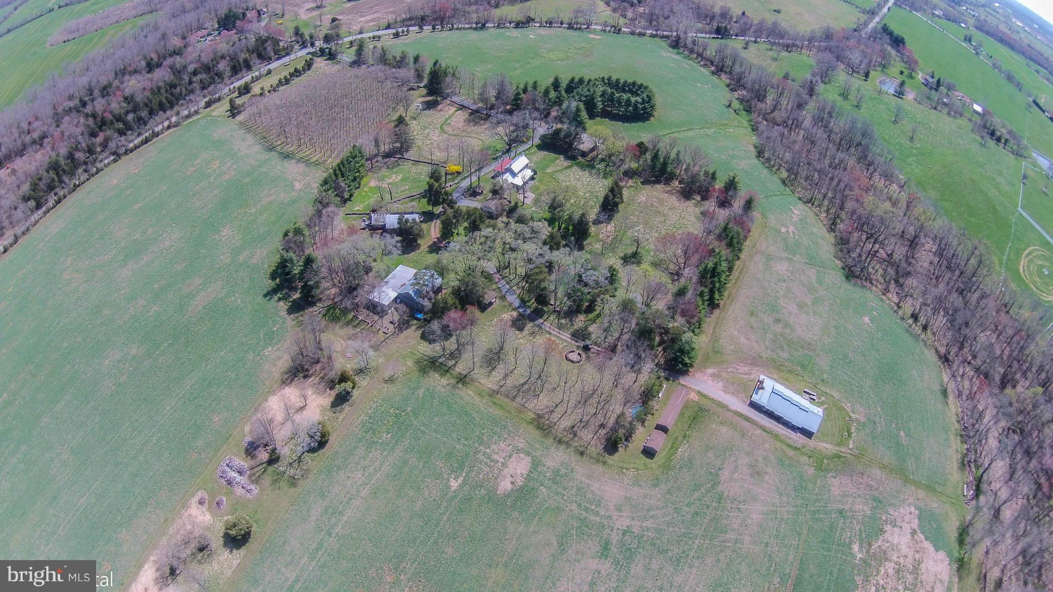 17300 White Ground Road Boyds, MD 20841 - Photo 14 of 18 an aerial view of a house with a yard