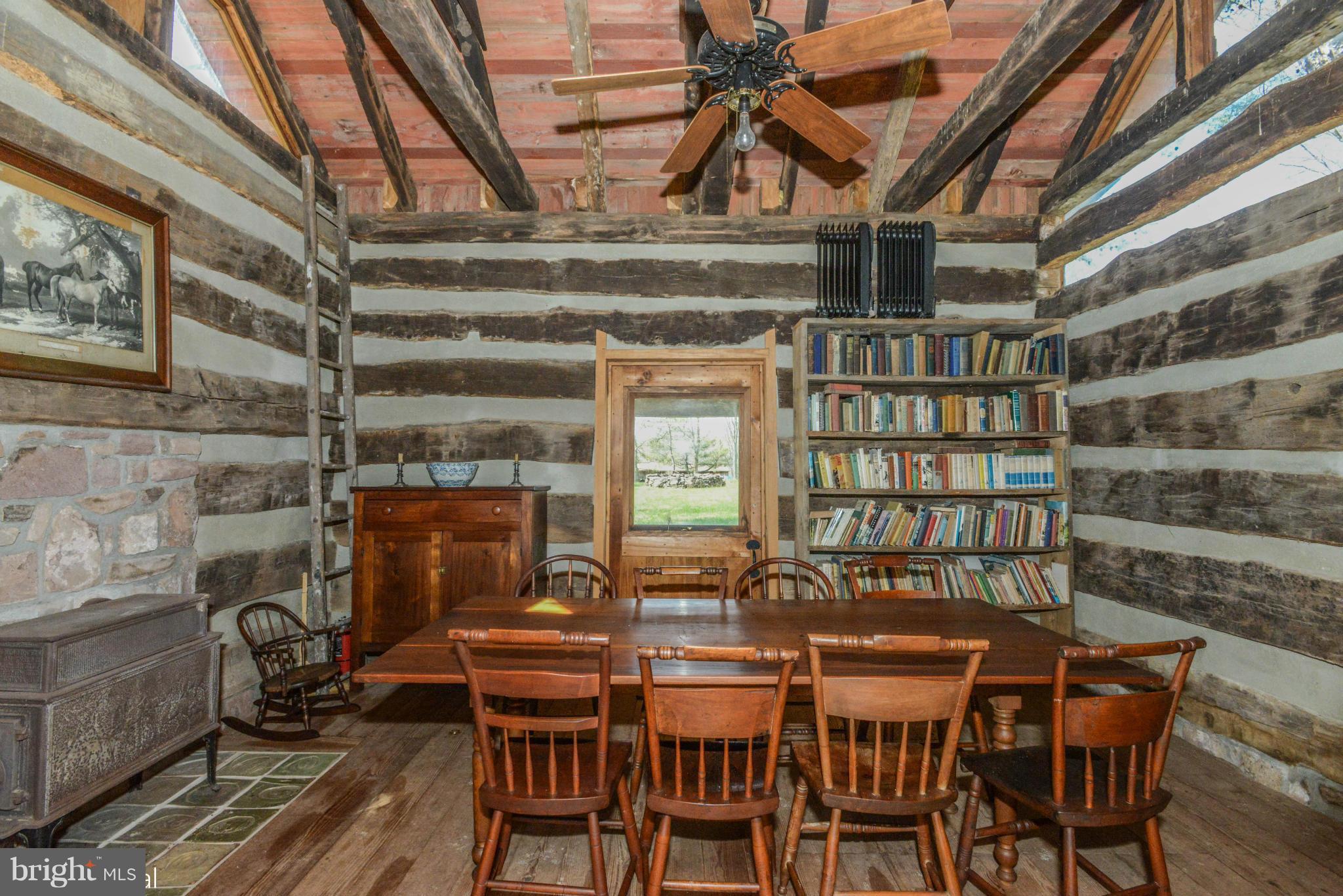 17300 White Ground Road Boyds, MD 20841 - Photo 5 of 18 a dining room with a wooden table and chairs