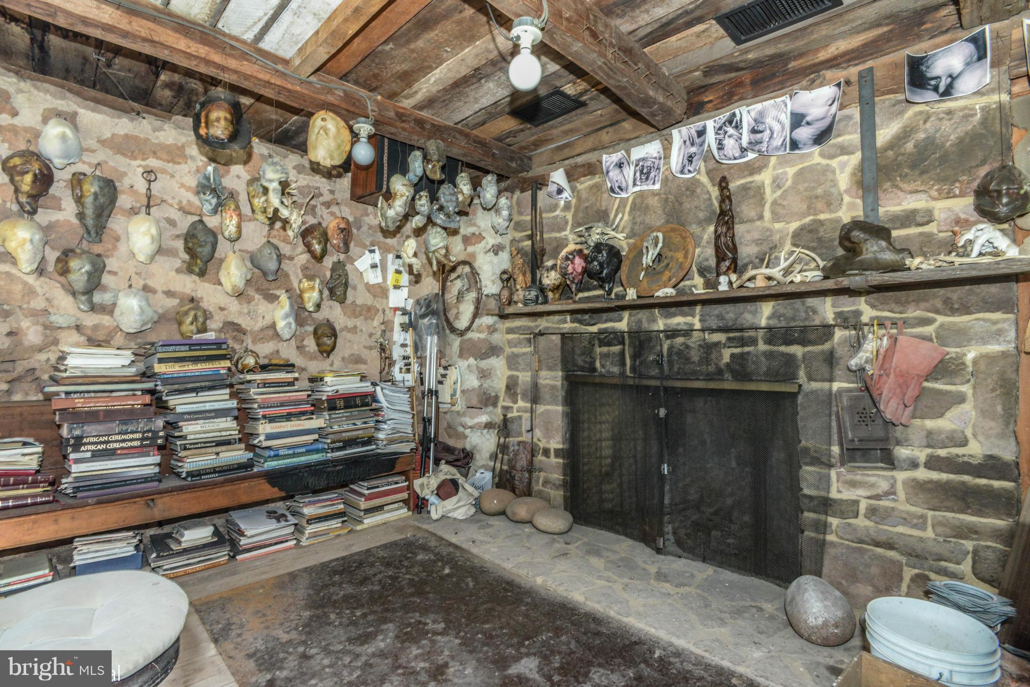 17300 White Ground Road Boyds, MD 20841 - Photo 8 of 18 a room with water heater and a wooden wall