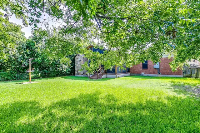 a view of a backyard with a garden