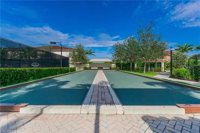 a view of swimming pool with a yard