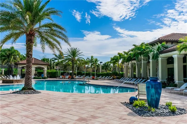 a view of swimming pool from a balcony