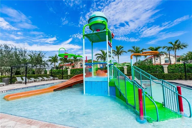 a row of palm trees and outdoor space